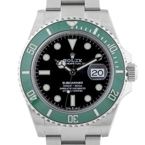 Rolex Submariner watch with a green bezel, black dial, silver band, and date display showing the 20th.